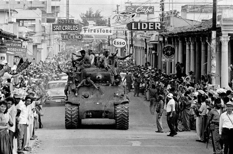 Tank moving through street, 1959
